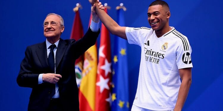 MADRID, SPAIN - JULY 16: Real Madrid new signing, Kylian Mbappe is unveiled by Florentino Perez Rodriguez, President of Real Madrid at Estadio Santiago Bernabeu on July 16, 2024 in Madrid, Spain. (Photo by David Ramos/Getty Images)